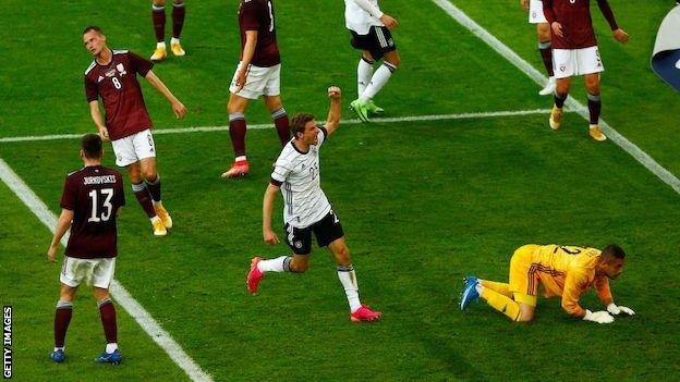 Thomas Muller celebrates after scoring