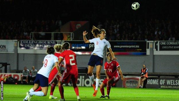 Jill Scott heads England's second goal