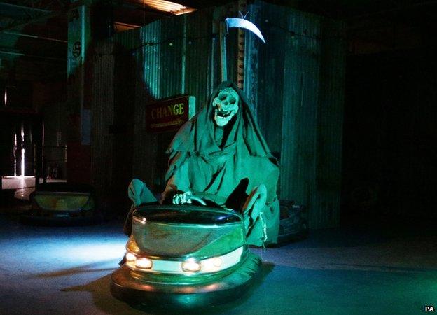 The Grim Reaper riding a dodgem