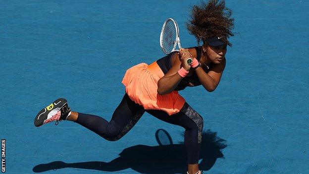 Naomi Osaka makes a shot