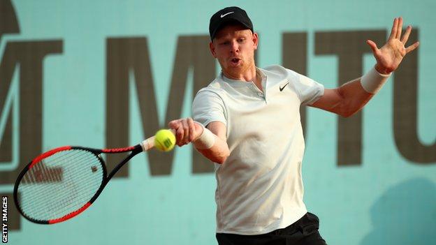 British number one Kyle Edmund plays a forehand against Daniil Medvedev