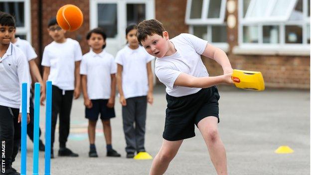 Children playing cricket