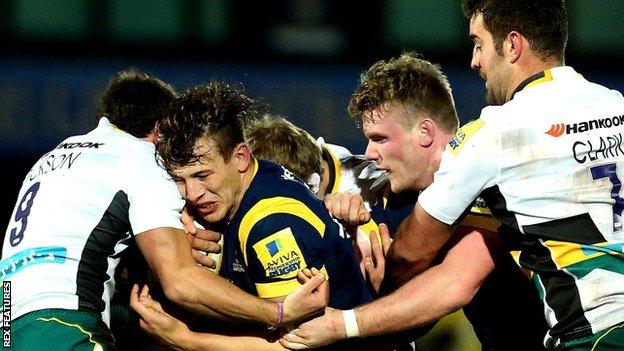 Worcester's Ryan Mills (second left) and Northampton's Calum Clark (right) were both yellow carded on the night at Sixways