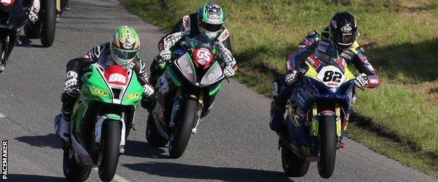 Derek McGee, Michael Sweeney and Derek Sheils compete in the feature race at the 2019 Tandragee 100