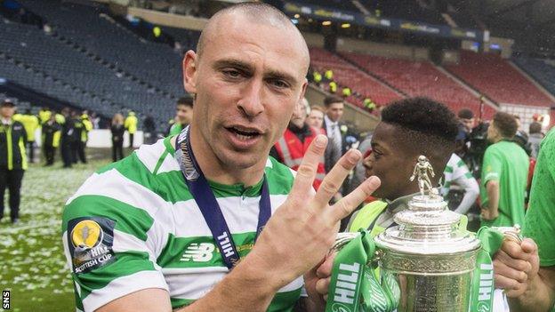 Scott Brown celebrates with the Scottish Cup