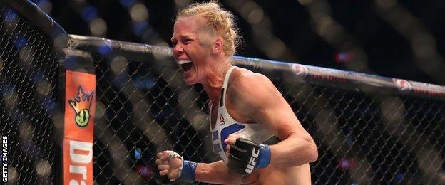 Holly Holm celebrates