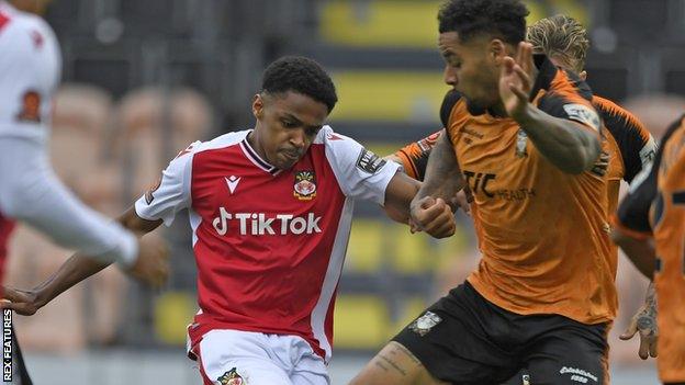 Bryce Hosannah has a shot on goal against Barnet