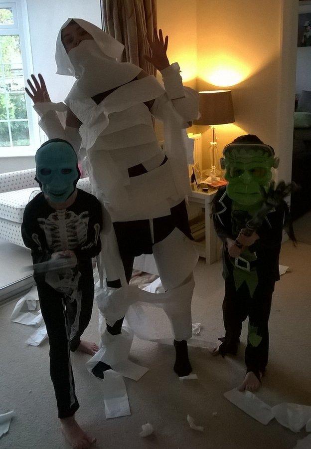 Oscar, 7 and Sam, 6 from Ilkley , turned Auntie Kabsie into a mummy with toilet roll!