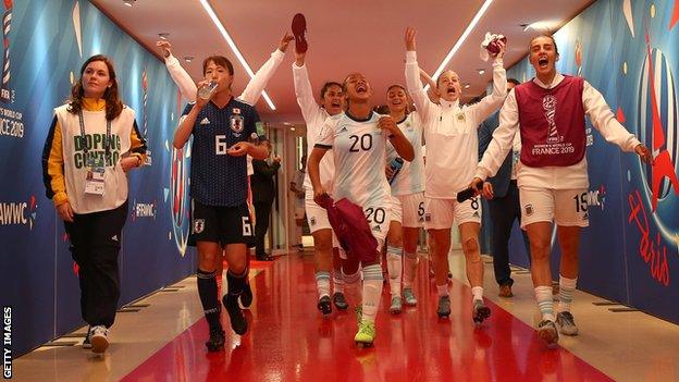 Argentina celebrate after their draw against Japan