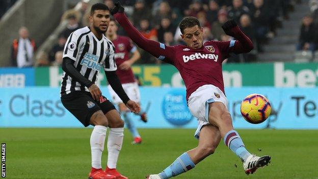 Javier Hernandez (right) scores