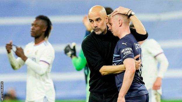 Pep Guardiola comforts Oleksandr Zinchenko at full-time in Spain