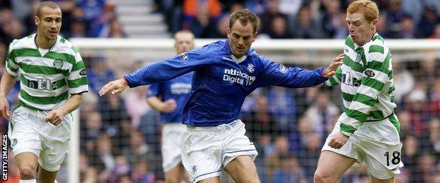 Ronald de Boer in action in the Old Firm game against Henrik Larsson and Neil Lennon