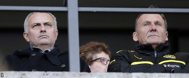 Jose Mourinho, left, and Dortmund president Hans-Joachim Watzke, right, attend the German Bundesliga soccer match between Hertha BSC Berlin and Borussia Dortmund in Berlin,