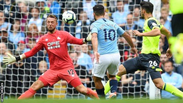 Huddersfield goalkeeper Ben Hamer in action against Manchester City