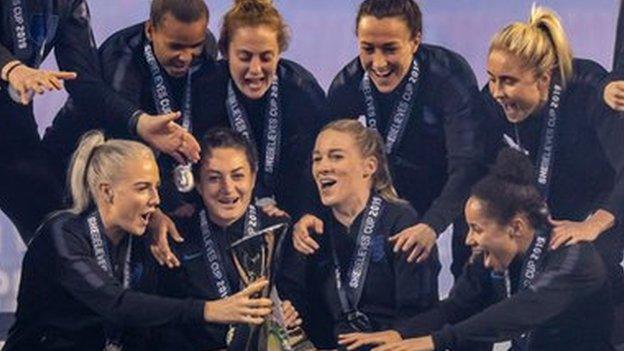 The Lionesses win celebrate winning the She Believes Cup