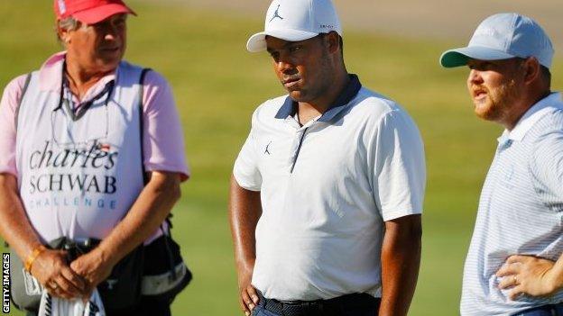 Harold Varner III observes a minute's silence for George Floyd