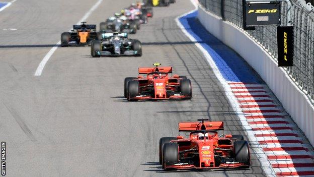 Sebastian Vettel leads Ferrari team-mate Charles Leclerc with eventual winner Lewis Hamilton trailing in the early stages of the Russian Grand Prix