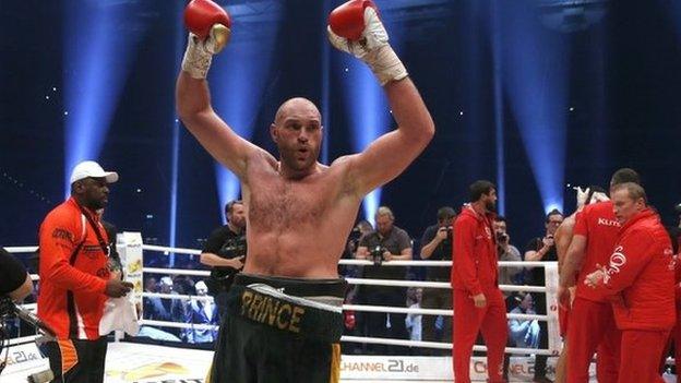 Tyson Fury celebrates victory