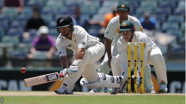 Ross Taylor sweeps during his marathon innings