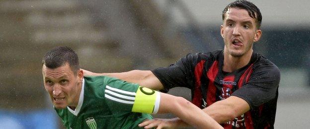 Ingemaar Teever of Levadia in action against Crusaders defender Josh Robinson