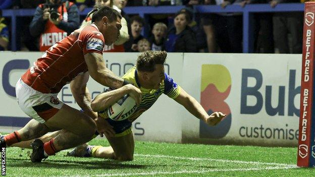 Matty Ashton scores a try for Warrington