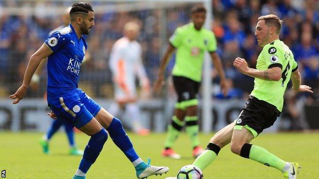 Dan Gosling of Bournemouth and Riyad Mahrez of Leicester