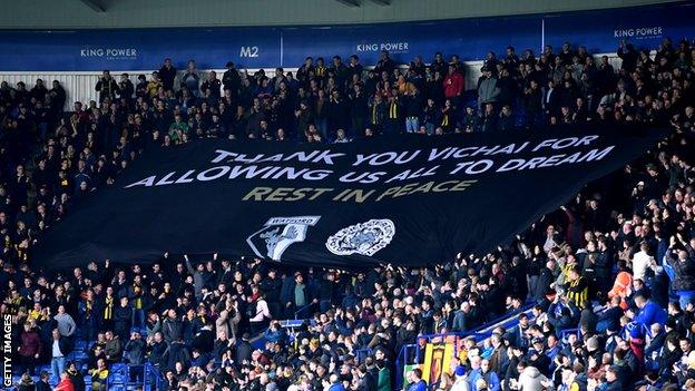 Watford fans hold aloft their banner at Leicester