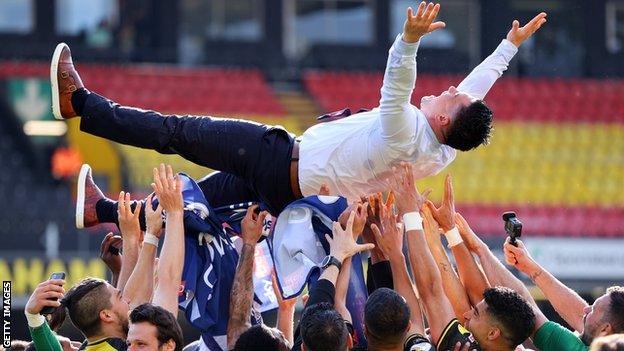 Watford players celebrate promotion with boss Xisco Munoz