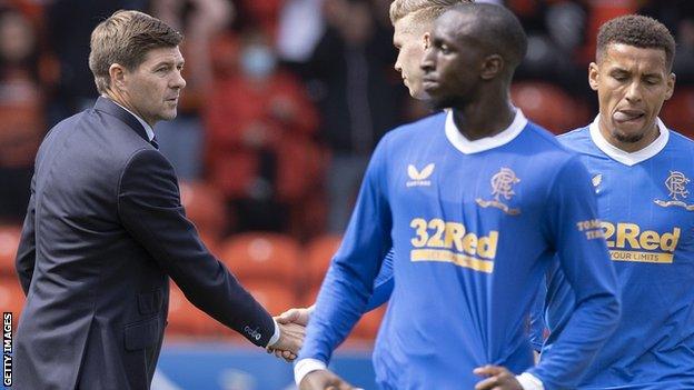 Rangers manager Steven Gerrard consoles his players