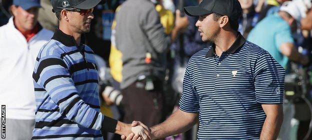 Adam Scott and Jason Day of Australia