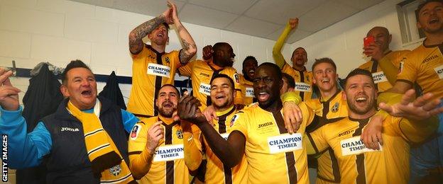 Sutton players celebrate