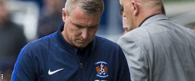 Lee Clark looks dejected after Kilmarnock's league cup defeat by Morton