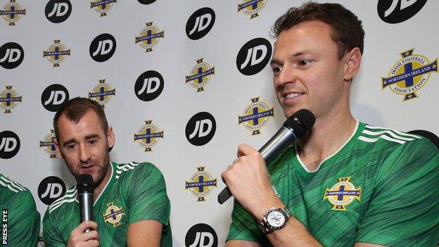 Niall McGinn and Jonny Evans