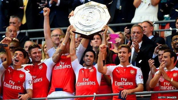 Arsenal lifting the trophy