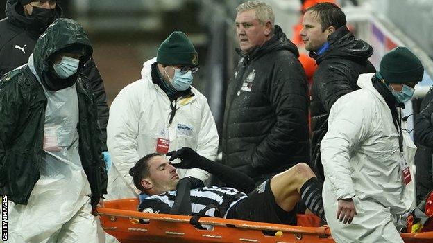 Newcastle United defender Fabian Schar is taken off on a stretcher against Southampton