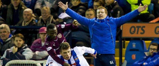 Hearts' Juwon Oshaniwa (left) battles for the ball against Kilmarnock's Adam Frizzell