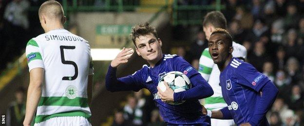 Anderlecht's Pieter Gerkens celebrates after Celtic's Jozo Simunovic (left) scores an own goal