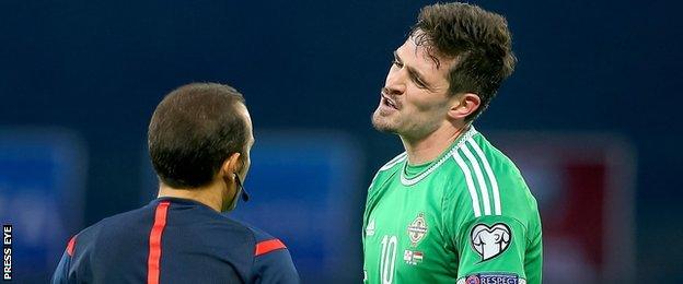 Kyle Lafferty picked up his third booking of the Group F campaign