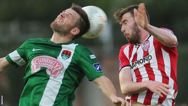 Steven Beattie and Patrick McClean in aerial action at the Brandywell