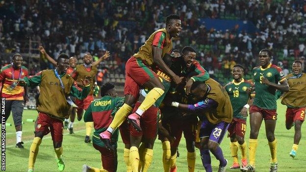 Cameroon players celebrate after reaching the Africa Cup of Nations final