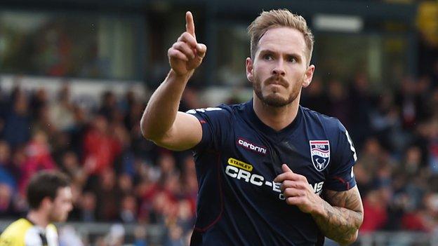 Martin Woods in action for Ross County