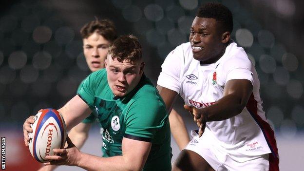 Ireland's Jack Boyle is chased by England's Emeka Ilione