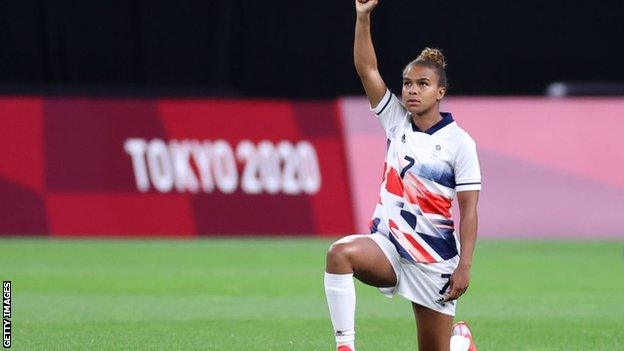 Nikita Parris takes the knee against Japan