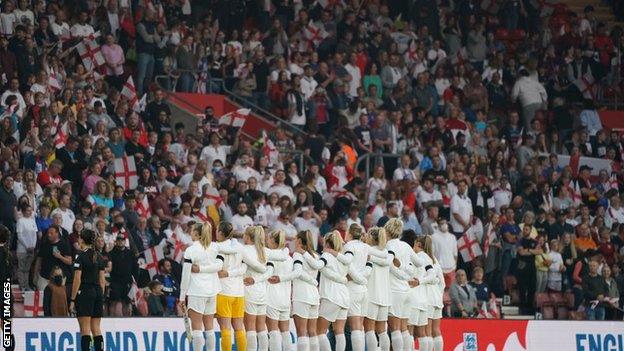 England players in front of fans at St Mary's Stadium