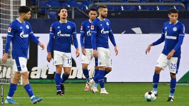 Dejected Schalke players after their team concede