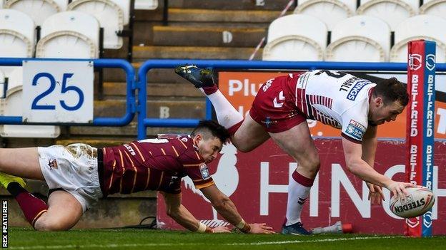 Liam Marshall scored the second of his three tries just before the break at the John Smith's Stadium