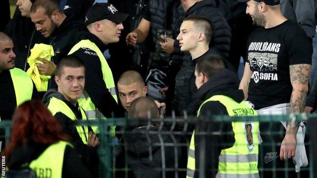 Stewards appeared to join those chanting racist abuse