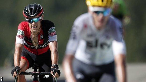 Richie Porte (left) follows Chris Froome over the finish line