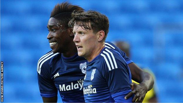 Joe Mason and Sammy Ameobi celebrate after Cardiff City take the lead against Watford