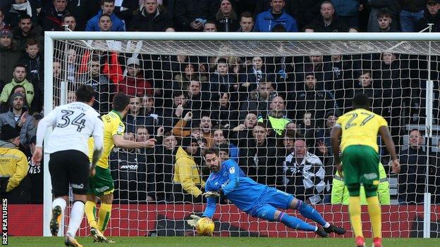 Derby County goalkeeper Scott Carson saves Nelson Oliveira's first-half penalty